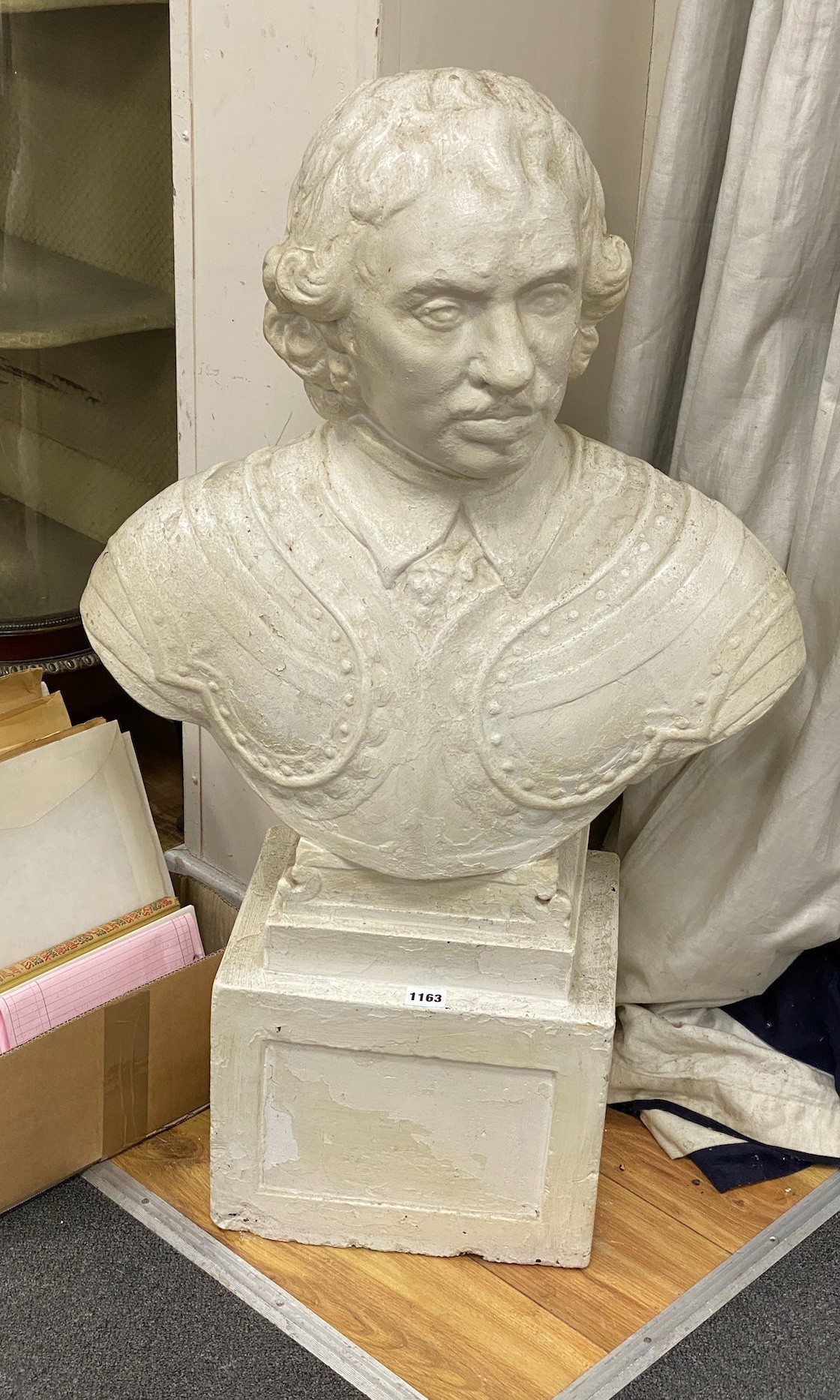 A plaster bust of Oliver Cromwell, height 90cm